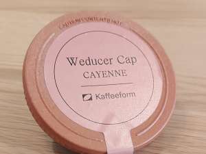 Weducer cap made with recycled coffee grounds and beech wood scraps